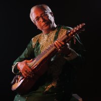 Pandit Debasis Chakroborty playing Indian slide guitar
