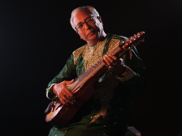 Pandit Debasis Chakroborty playing Indian slide guitar
